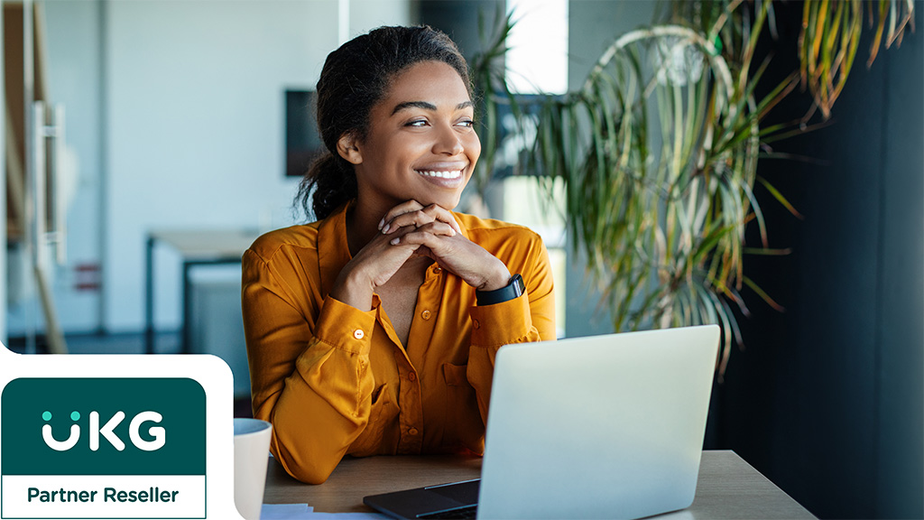 Smiling woman looking confident and assured, representing the accuracy of managed payroll services.